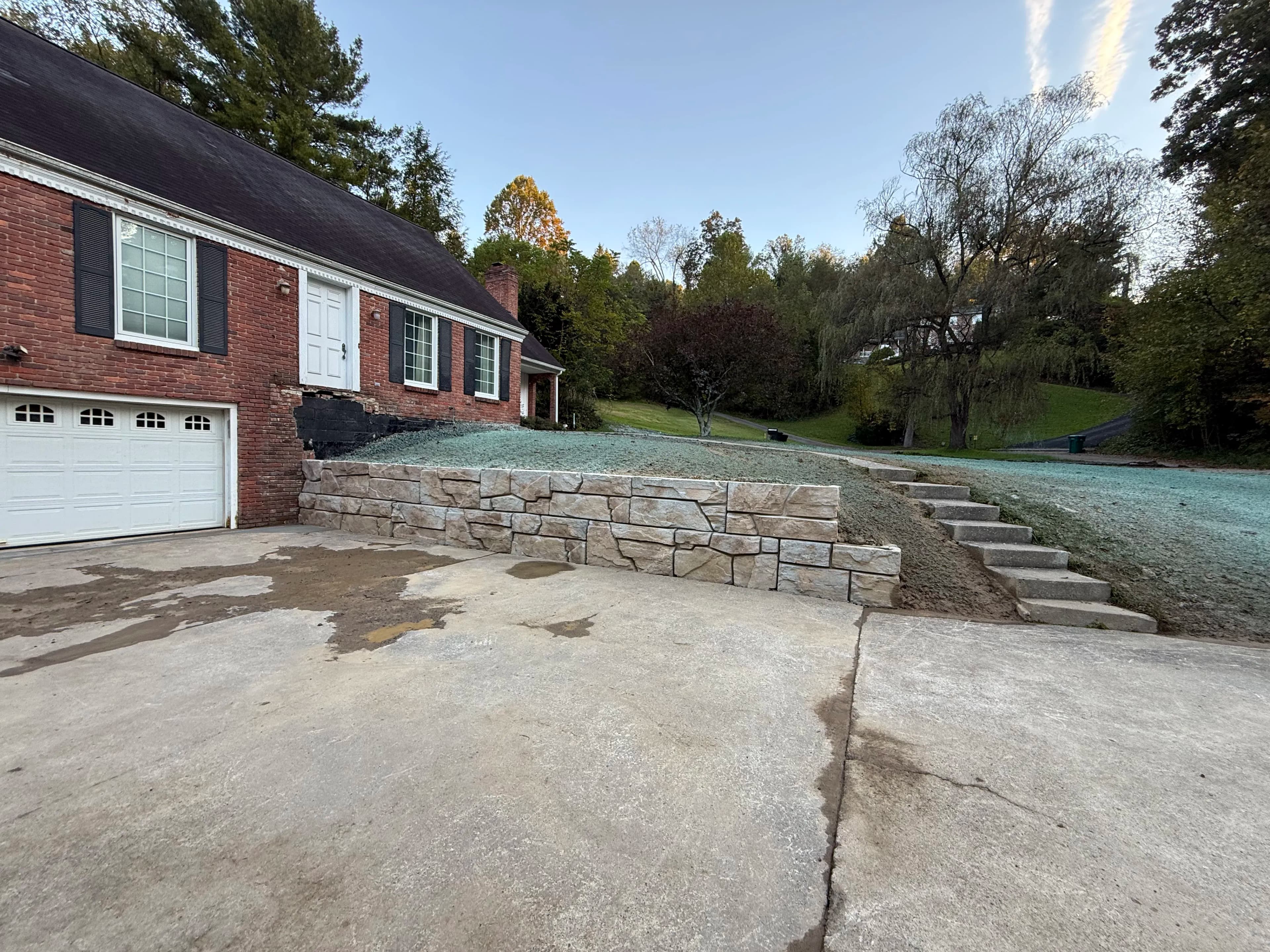 Project Retaining Wall, Box Drain and Hydroseeding Upgrade for a Brick Home image
