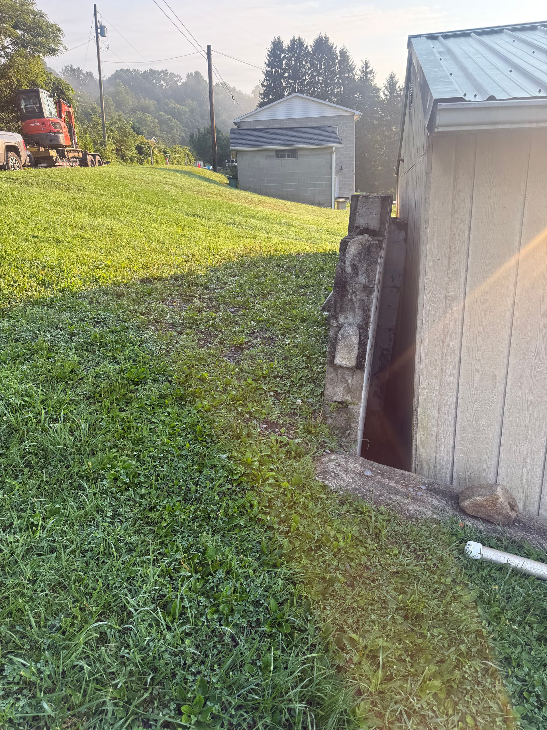When a Leaning Retaining Wall Gets the Fix It Actually Needs