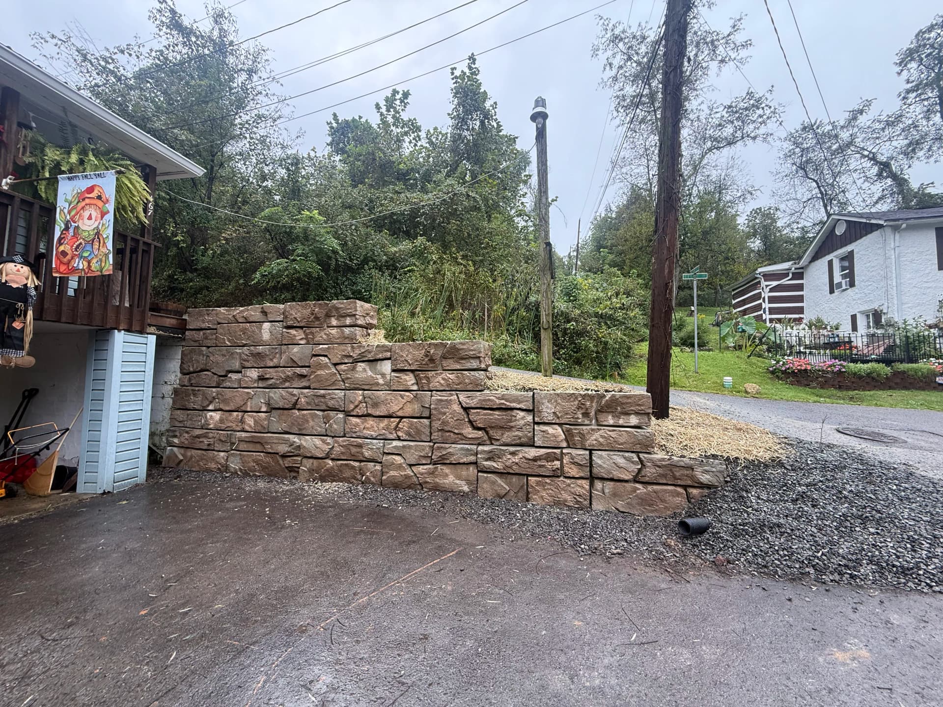 Keeping the Hill in Check with a Solid Retaining Wall image